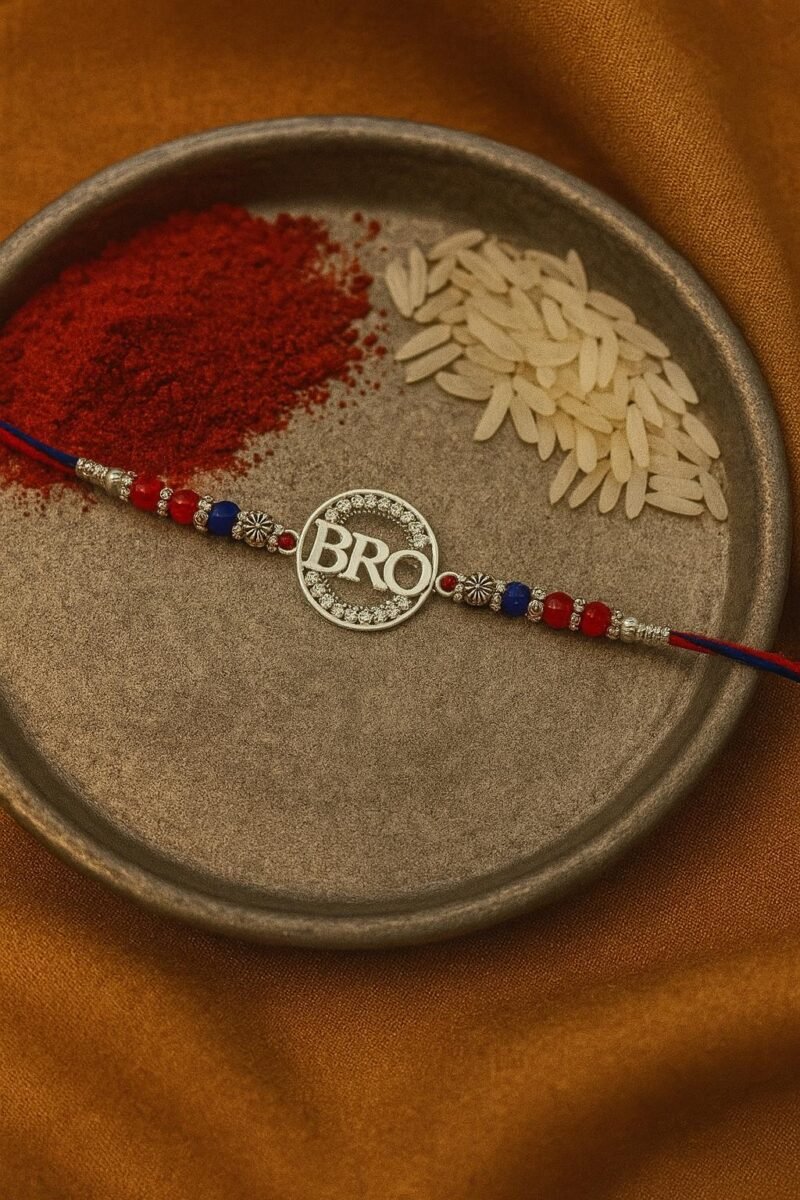 ✨ Silver “Bro” Rakhi with Blue Thread 💙