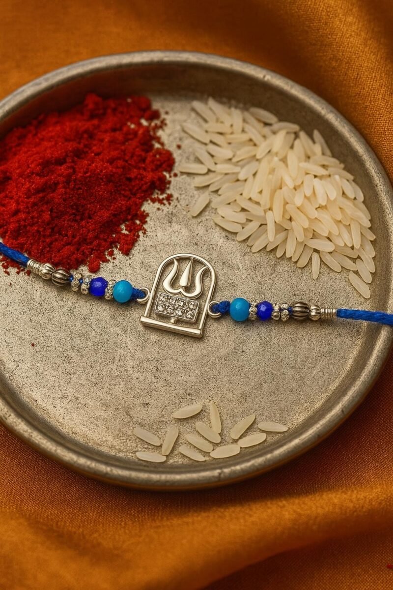 Silver Divine Blessing Rakhi – Power & Protection on Blue Thread