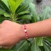 Swastik Rakhi – Divine Red Thread with Spiritual Center for Brother